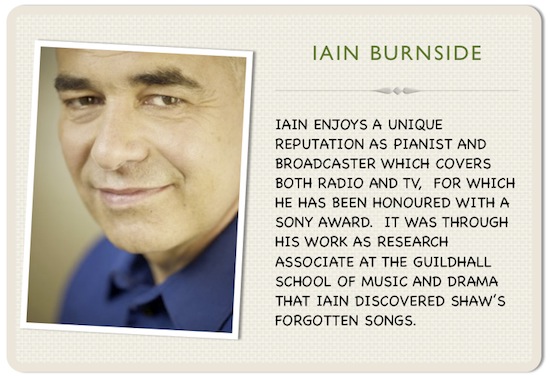 Iain Burnside wearing a blue shirt